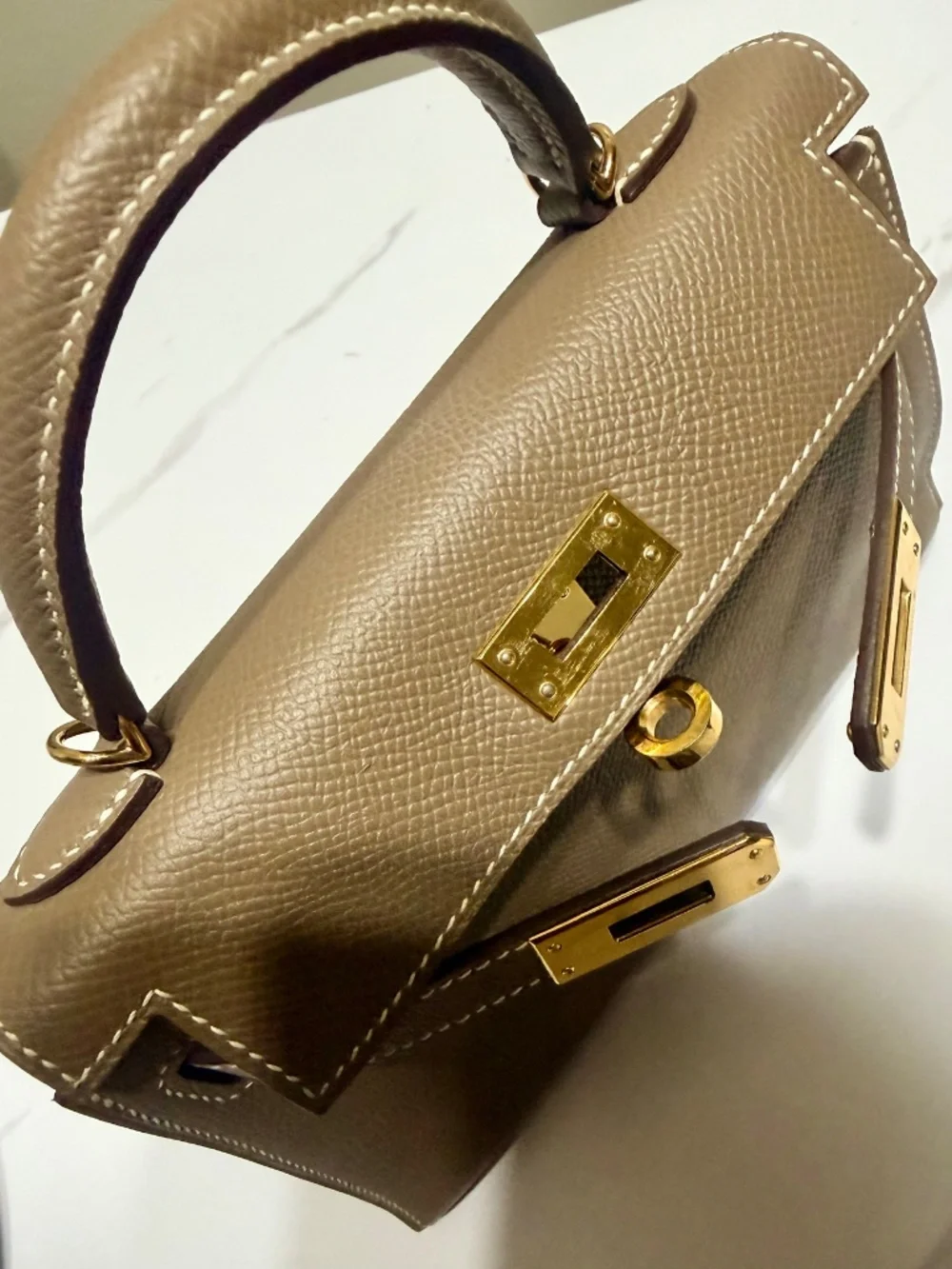 Mini top handle bag.. Kelly